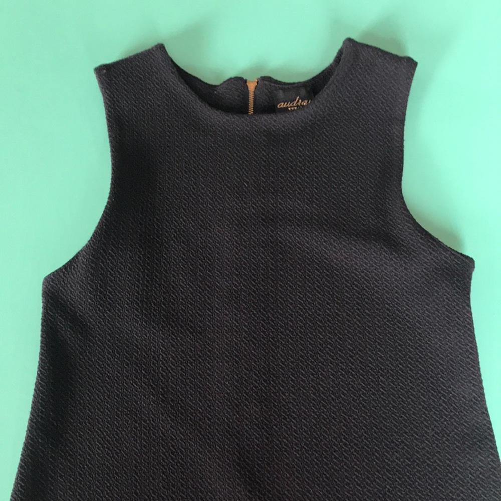 Adorable A-line black dress with gold zipper
